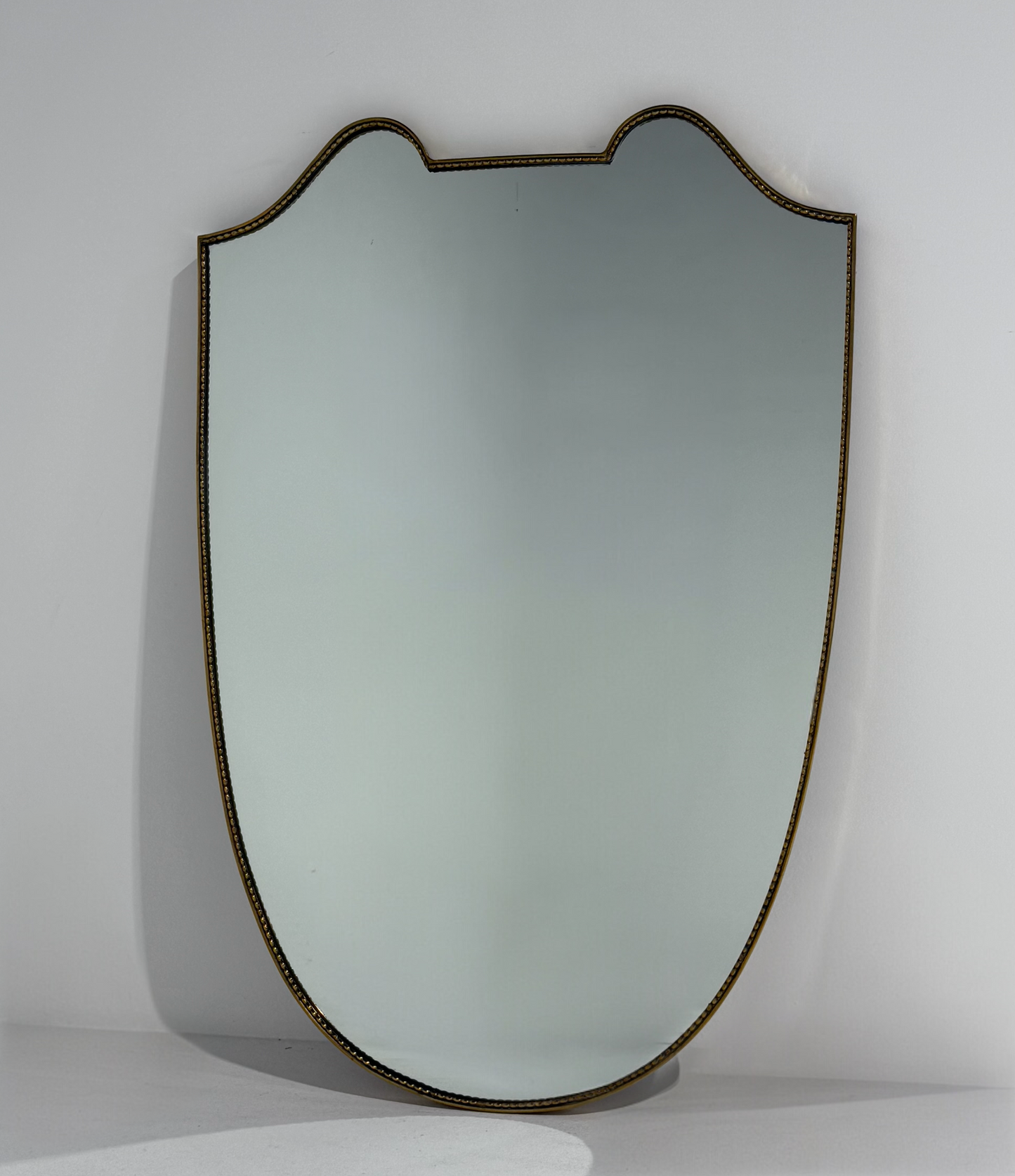 Large Vintage Italian Brass Shield Mirror.